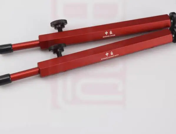 Red metal calipers with black knobs and engraved chinese characters for upright piano action repair parts