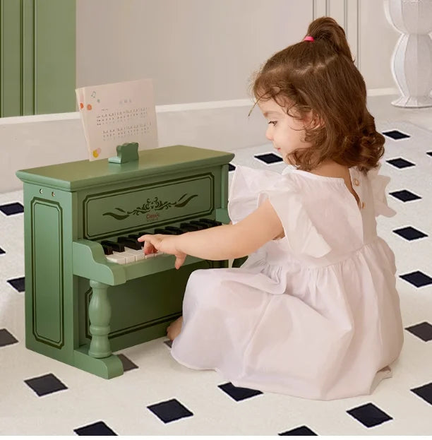 Green wooden piano wooden boys can play mechanical music with black and white keys from beat music store