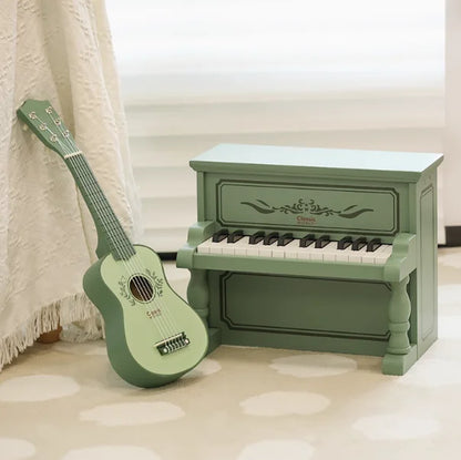 Pastel green piano wooden boys and girls can play mechanical music with black white keys and floral inlay from beat music store