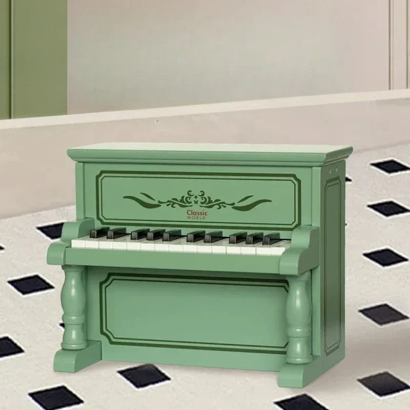 A mint green piano wooden boys and girls can play mechanical music with ornate detailing from beat music store