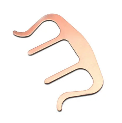 Copper-colored metal holder clip music tool with three curved prongs for pianos stands song and speech draft cooking use