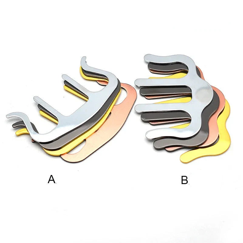 Set of metallic hand-shaped dental impression trays in silver gold rose gold and black for pianos stands song holder clip music
