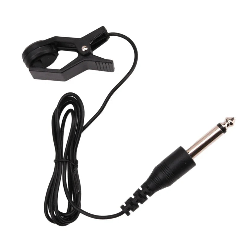 Black clip-on piezo contact microphone cable with 6.35mm jack and coiled wire for guitar pickup shows package