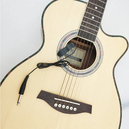 Picture shows package of a black clip-on piezo guitar pickup with coiled cable and 1/4-inch audio jack for acoustic guitars