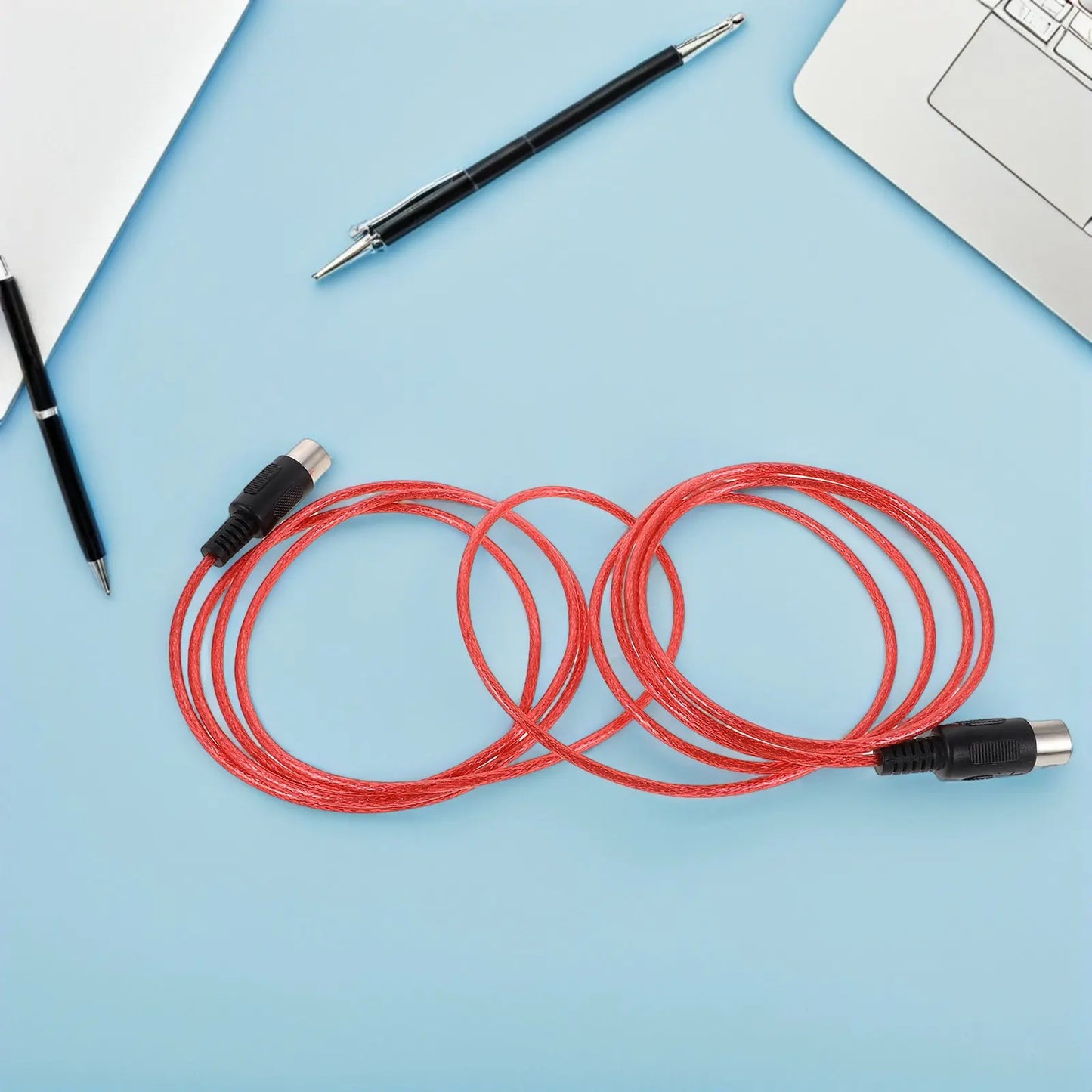 Red braided pin midi cable with black connectors and silver metallic ends for digital piano synthesizer music production audio