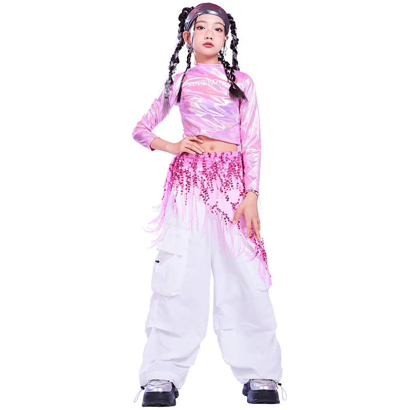 Pink hip hop long sleeve laser crop top with shimmering holographic finish and subtle white text on chest for stage use