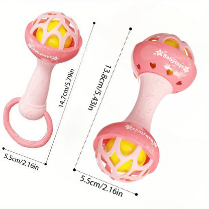 Pink plastic baby rattle with yellow interior and heart-shaped cutouts made of durable ABS for newborns and toddlers