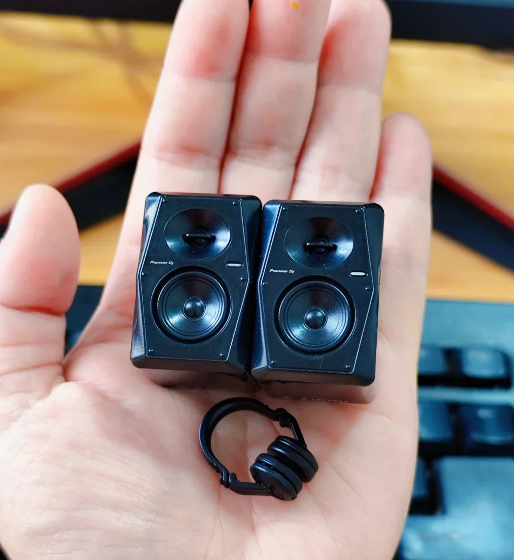 Black miniature model mixer and pioneer dj controller with matching headphones designed as player keychain collectible gear
