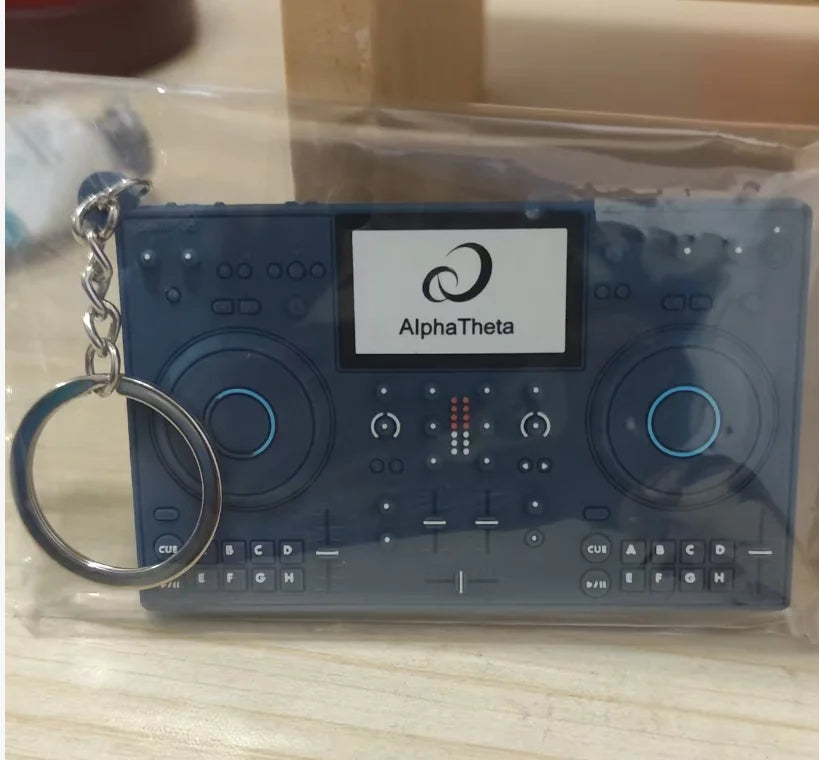 Dark blue plastic pioneer dj controller player keychain miniature model mixer with illuminated knobs and central screen logo