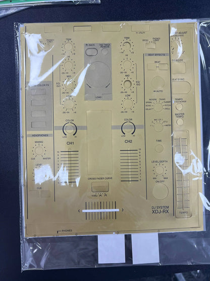 Gold-colored pioneer dj film adhesive protective film on xdj-rx mixer control panel with detailed knobs and sliders type beat