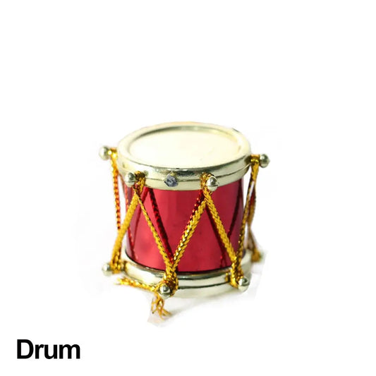 A shiny red miniature drum with gold lacing and metallic hardware for doll piano craft and pianoforte doll accessories