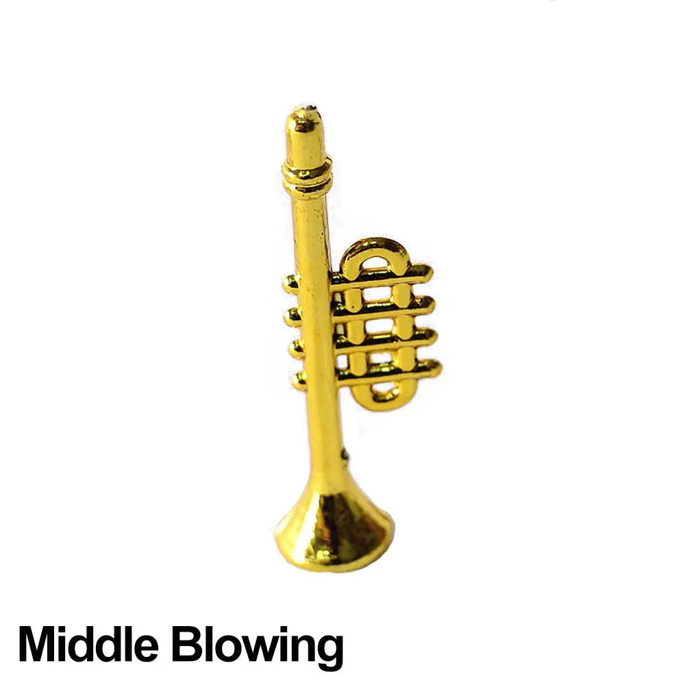 Golden miniature trumpet pin with detailed brass finish as a pianoforte doll accessory for doll piano craft sets