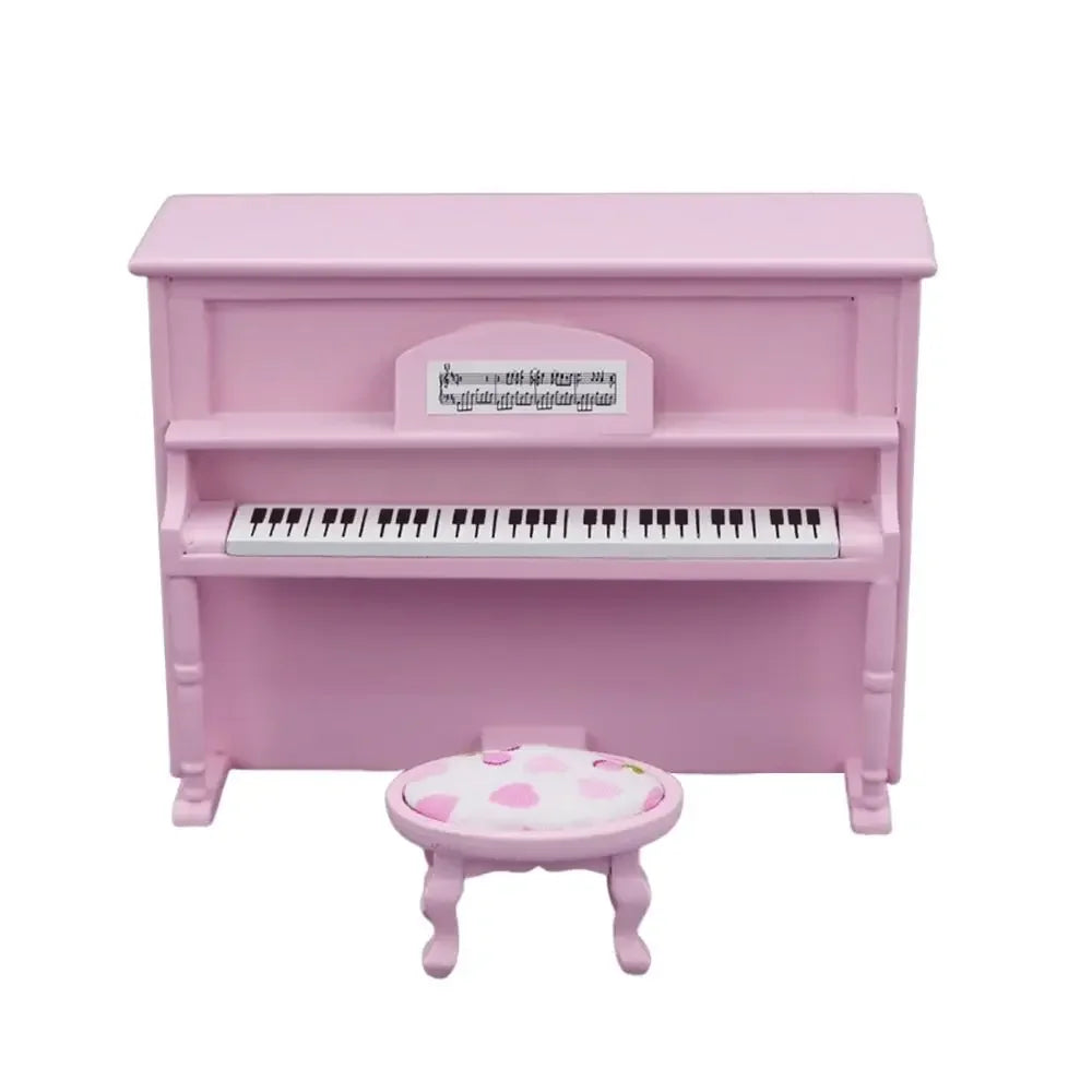 Pink miniature upright doll piano craft in wood with black and white keys and heart-patterned stool pianoforte doll accessories