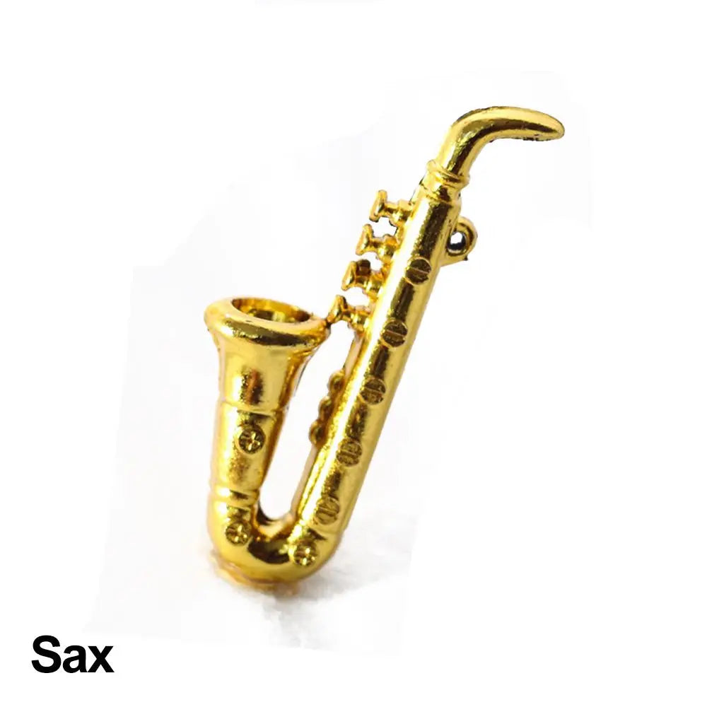 Golden saxophone-shaped pendant with polished metallic finish and detailed keywork for pianoforte doll accessories