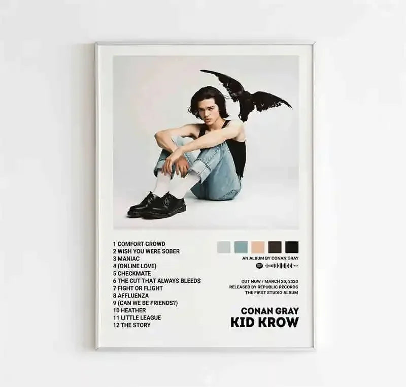 Framed canvas wall art poster featuring conan gray in a black tank top with a black bird on his shoulder for room decor