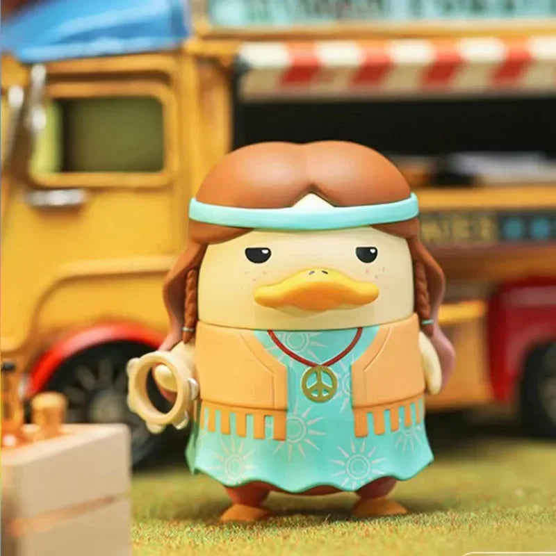 A pop mart duckoo music festival mystery box toy featuring a duck figurine with brown braided hair and turquoise dress