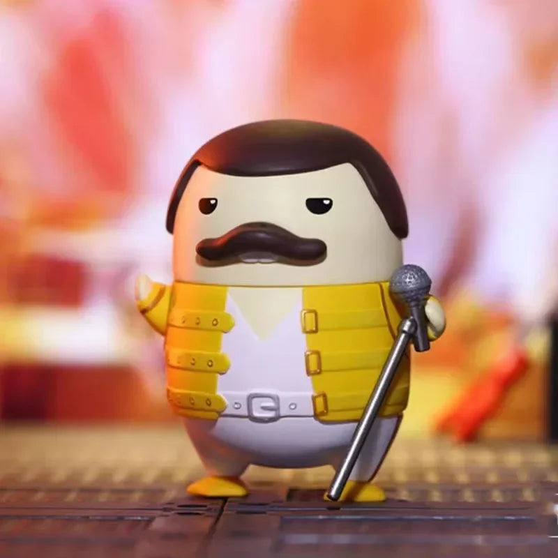 A cute stylized figure of freddie mercury in yellow vest from pop mart duckoo music festival mystery box toys collection