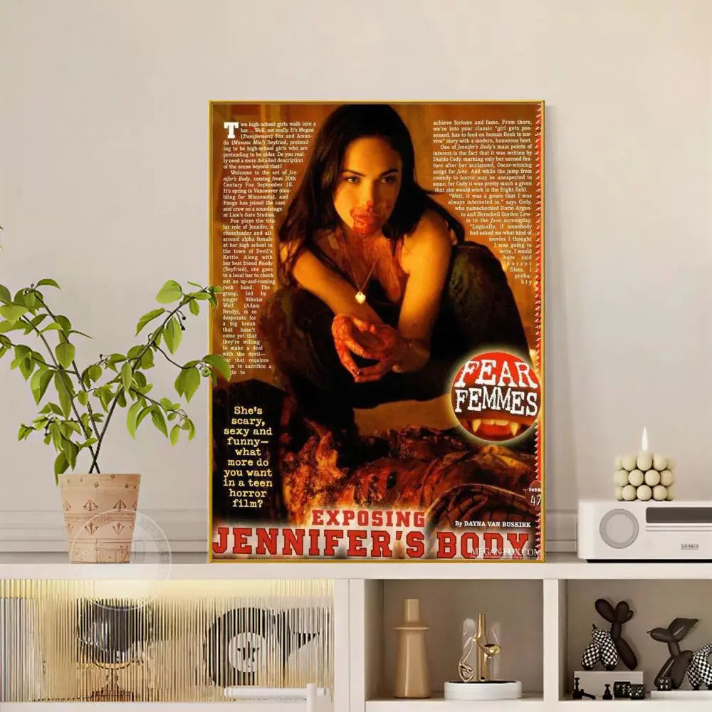 A modern graphic pop movie jennifer body poster featuring a woman with dark hair and blood on her face against text background