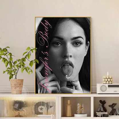 Black and white framed portrait of megan fox with pink cursive jennifers body text modern graphic pop movie poster
