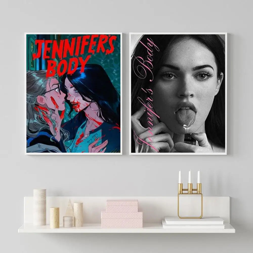 Two framed jennifer body posters featuring colorful comic-style and black-and-white megan fox portrait in modern graphic design