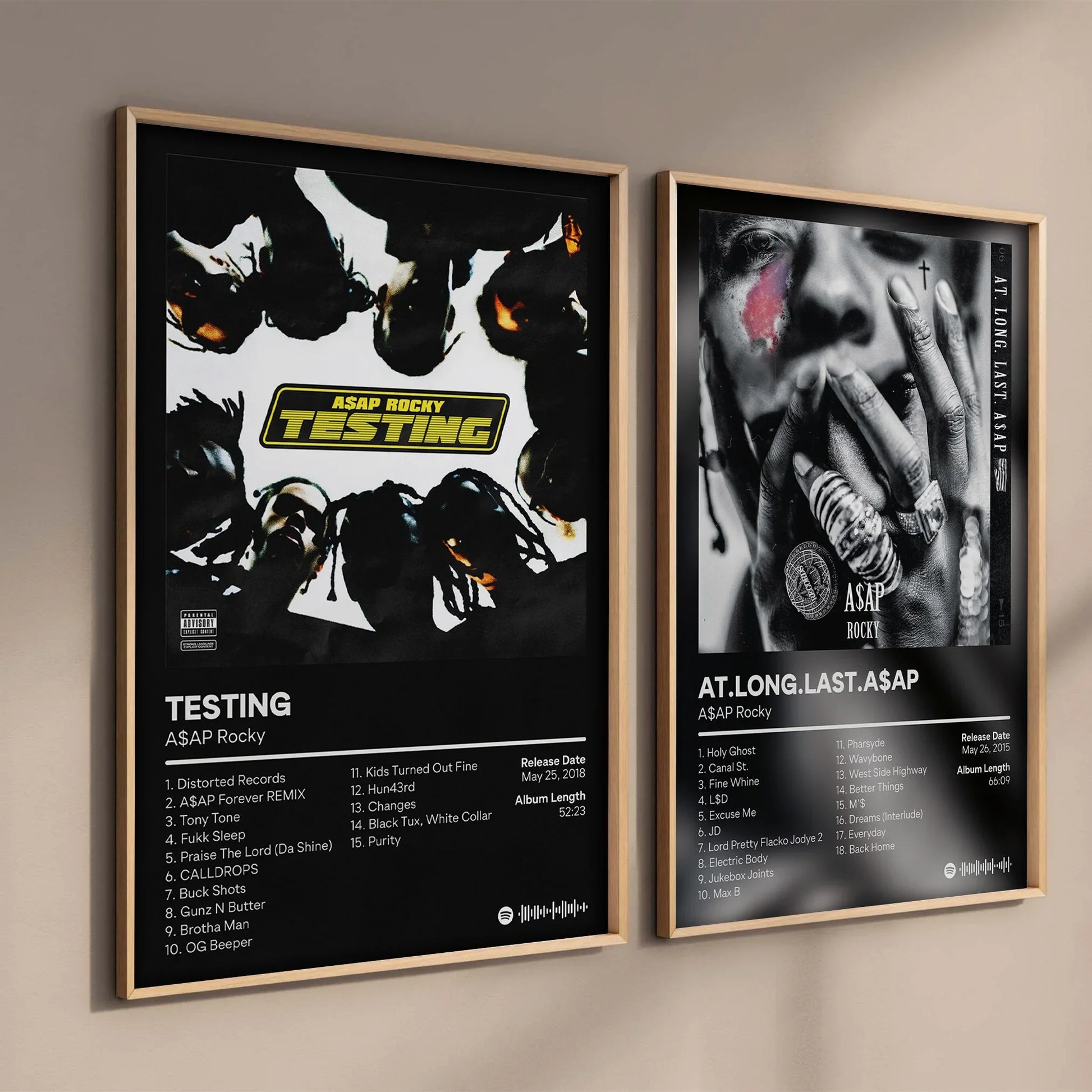 Two framed asap rocky pop rap album canvas posters featuring testing black and white design with yellow text and at album art
