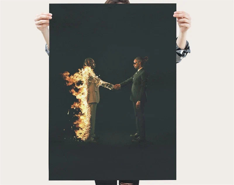 Dark poster featuring two men in suits shaking hands one engulfed in flames pop rap singer metro boomin canvas print wall art