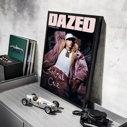 A framed dazed magazine cover poster featuring central cee in a pink puffer jacket with lighting effects ideal for working days decor