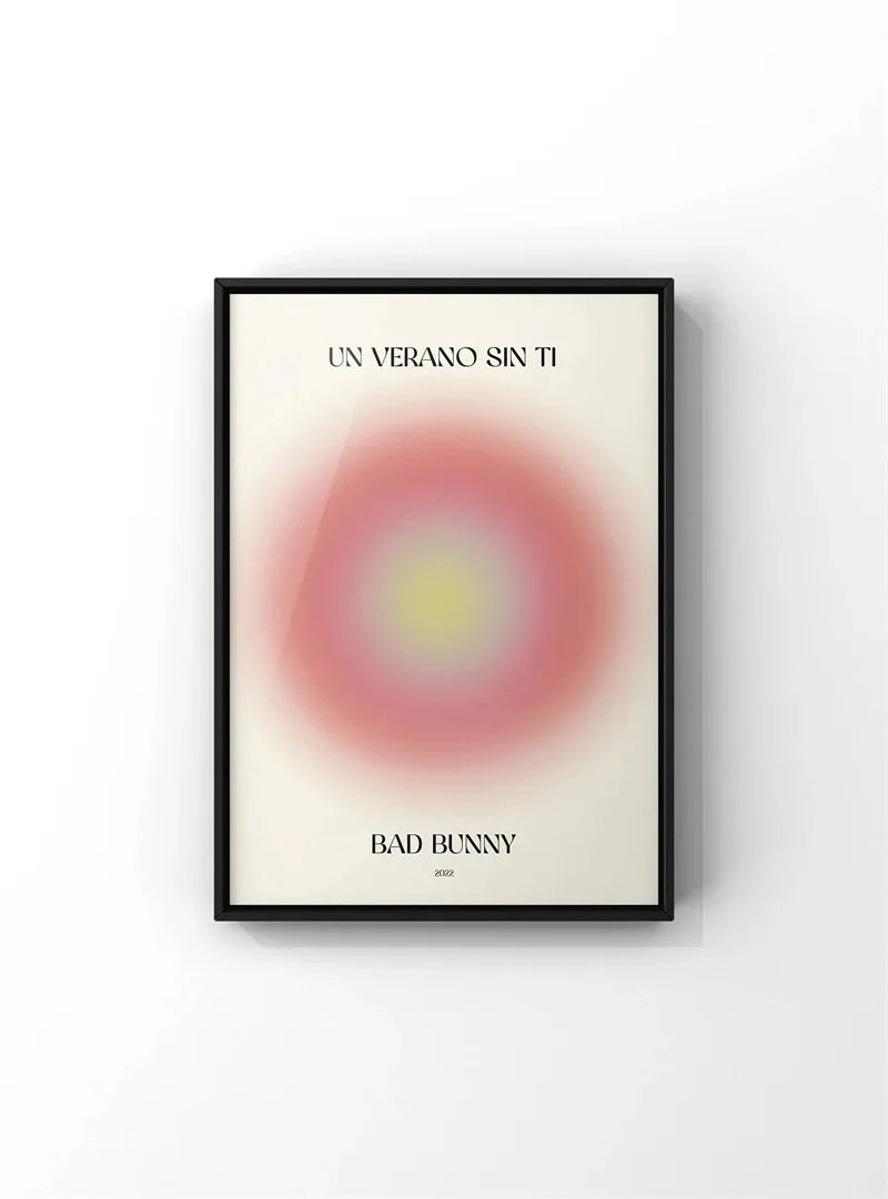 Black-framed poster with pink and yellow gradient circle and bad bunny un verano sin ti 2023 text for room decor