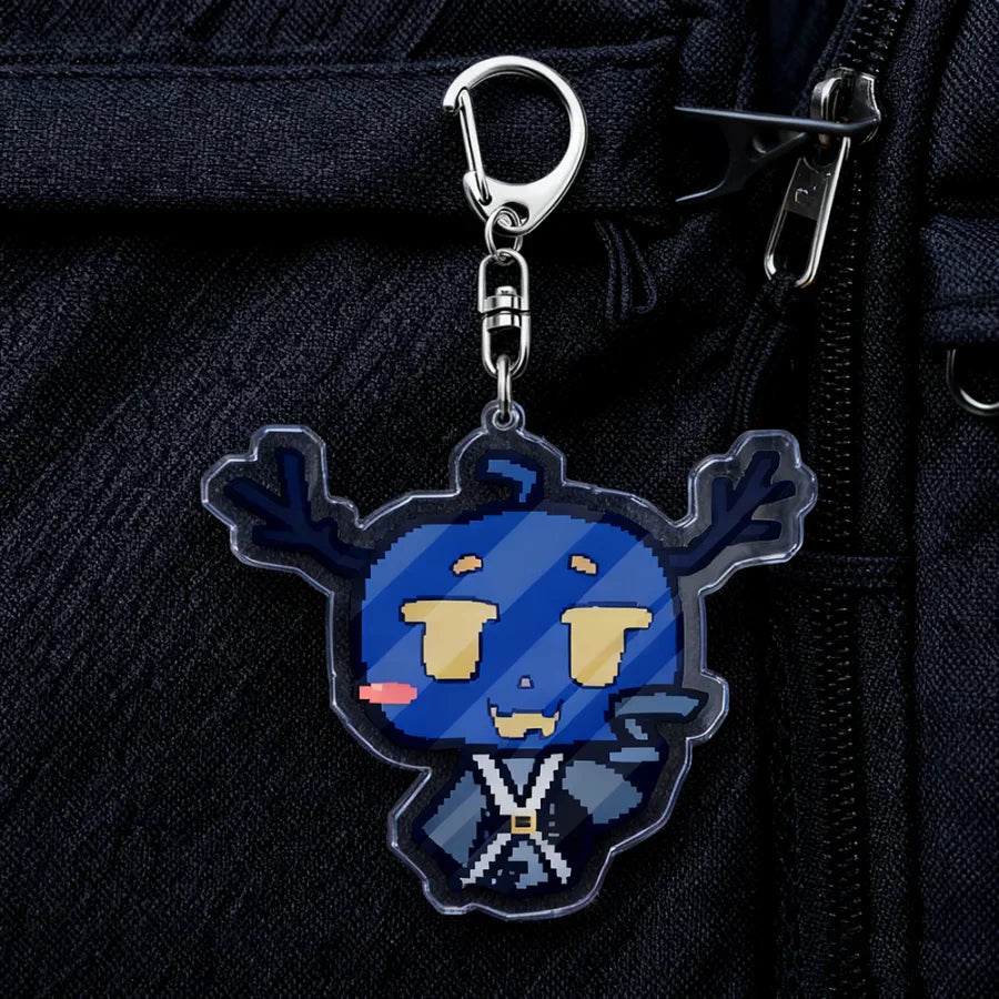 Blue pixelated game cartoon chibi keychain with yellow eyes and silver carabiner clip for bag accessories and gifts
