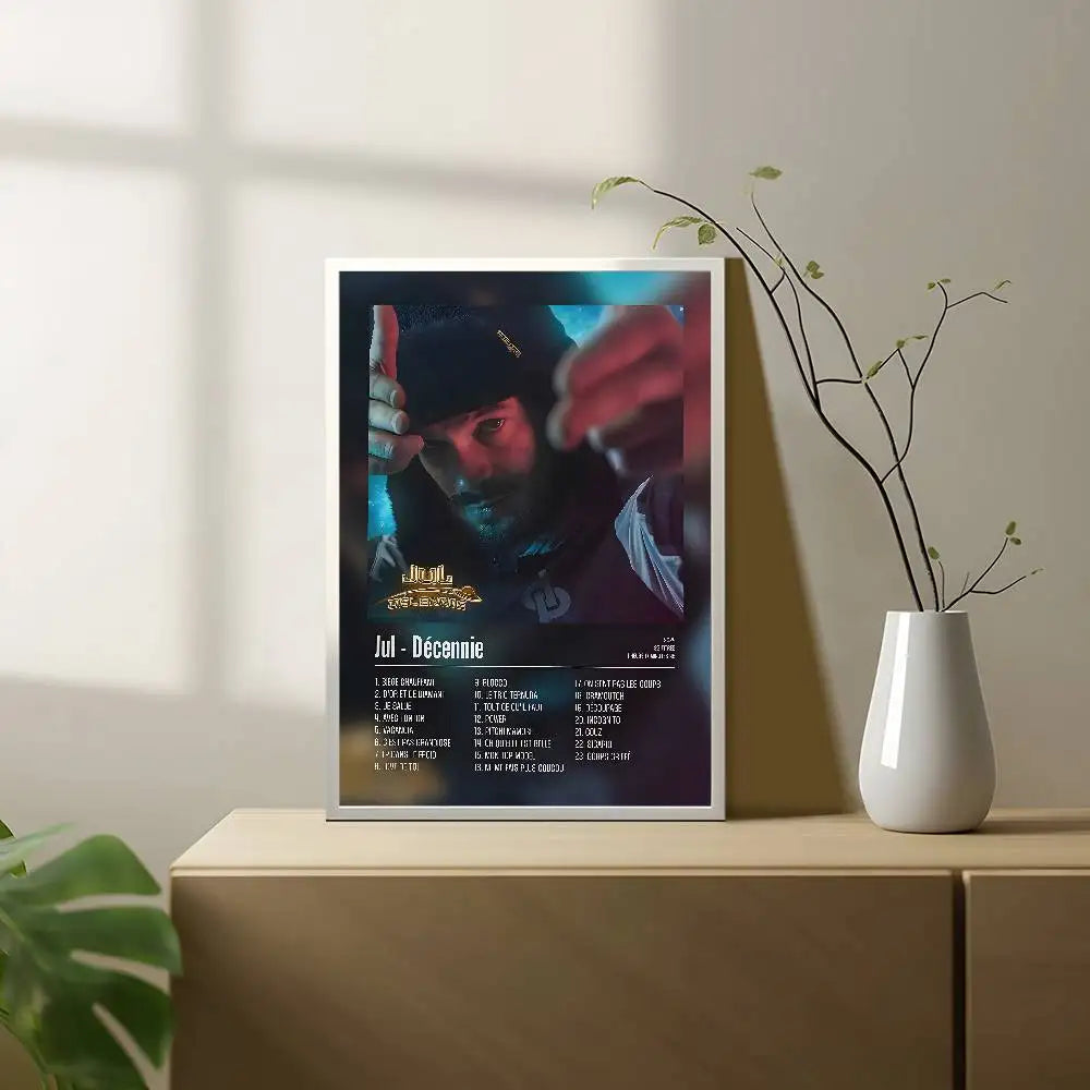 A framed poster featuring popular music rapper j jul in maroon shirt with tour dates for posters aesthetic wall decor