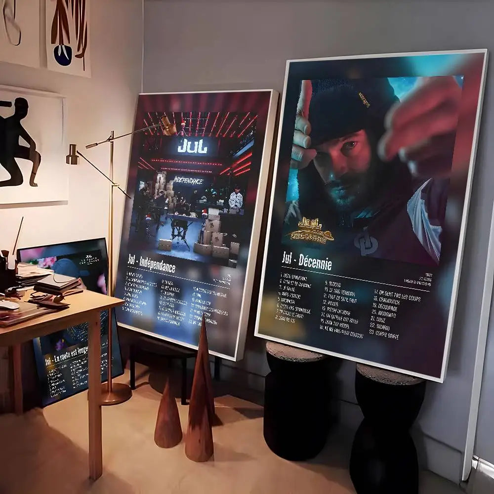 Two large framed posters featuring a popular music rapper with vibrant red and blue lighting for living room decor