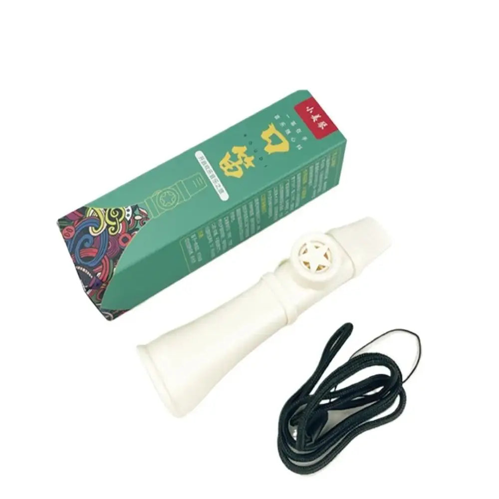 White plastic portable abs kazoo musical whistle toy with circular mouthpiece and black lanyard for easy learning instruments