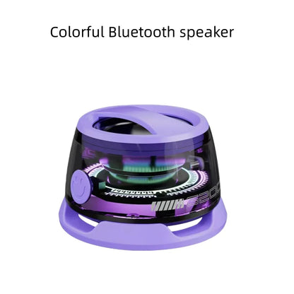 Portable bluetooth speaker hecate g200 with purple and black translucent design, rgb lighting, smiley face button, and magnetic base