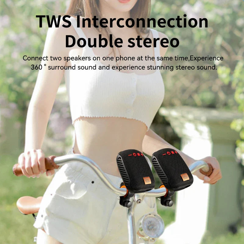 Black bluetooth speaker wireless with orange accents and textured fabric finish designed for bike handlebars woofer mini waterproof