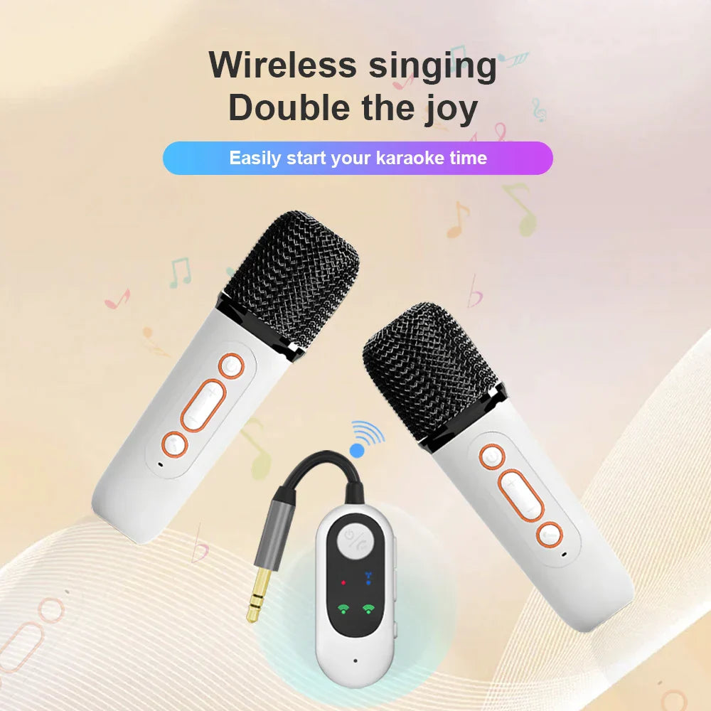 White wireless karaoke microphones with black mesh grilles and orange buttons paired with portable car karaoke bluetooth ktv speaker receiver