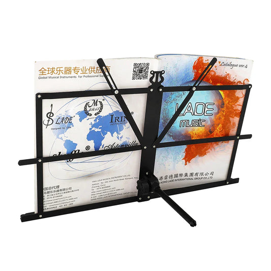 Black metal foldable music stand with adjustable arms and sturdy base holding printed sheet music for portable desktop use
