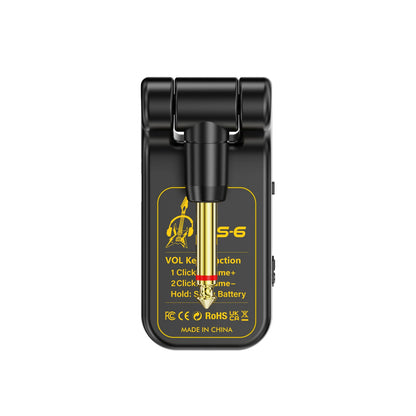 Black s-6 wireless guitar tuner with gold 1/4-inch audio jack and yellow labeling for portable guitar headphone mini amp with rechargeable lithium battery