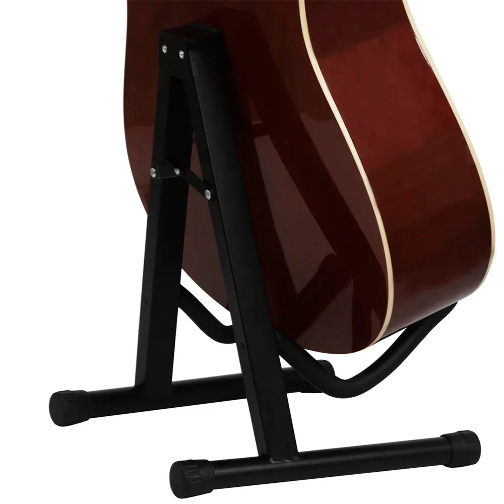 Black metal portable guitar stand with musical bracket foldable design supporting glossy reddish-brown acoustic guitar