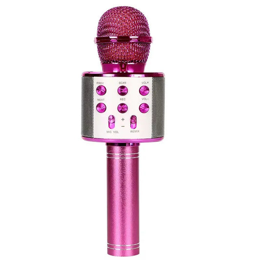 A vibrant pink wireless karaoke microphone speaker with textured mesh grille and metallic controls for kids music player use