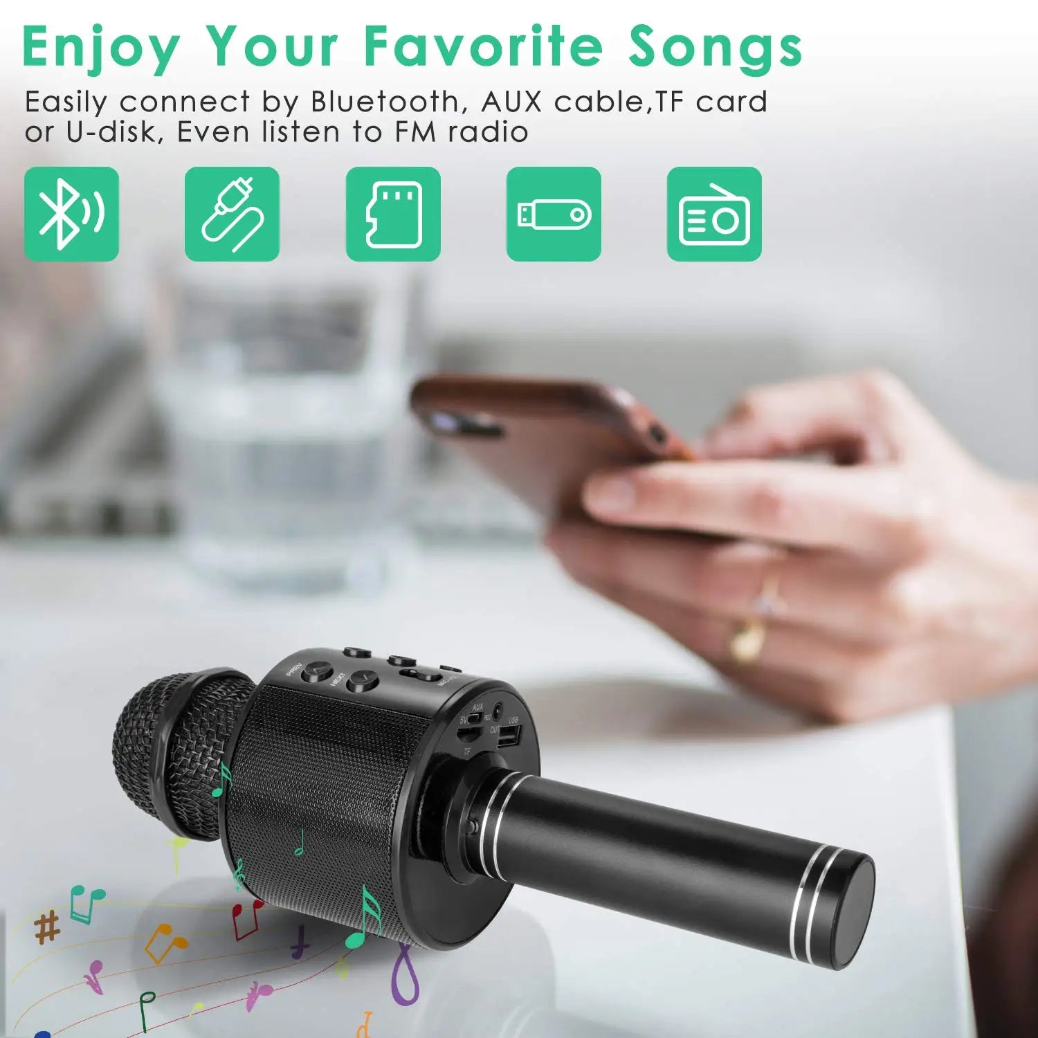 Black wireless karaoke microphone speaker with textured grille and silver accents for kids music player and singing recorder use