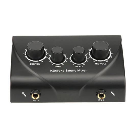 Black karaoke sound mixer with four rotary knobs and gold microphone inputs for professional dual mic digital audio sound use