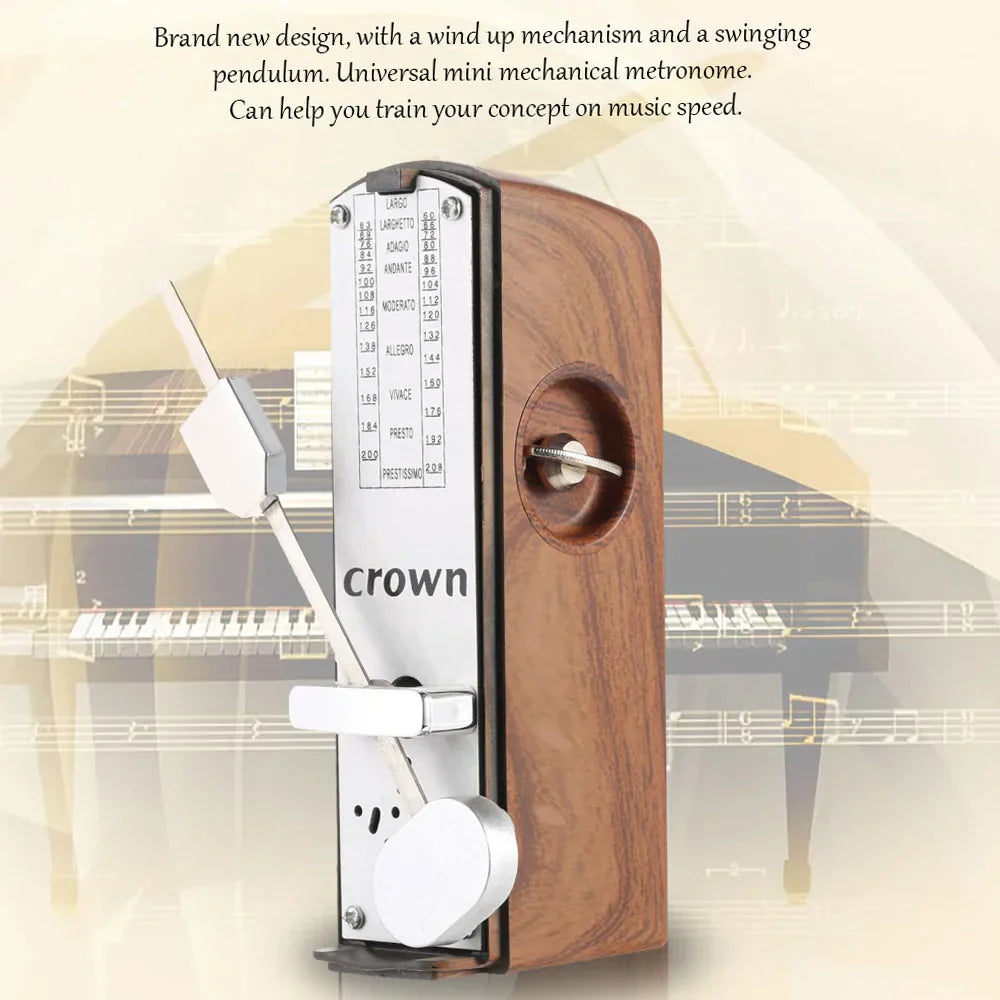 Crown brand portable mini mechanical metronome with wooden body and silver metal parts for piano guitar violin and chinese zither