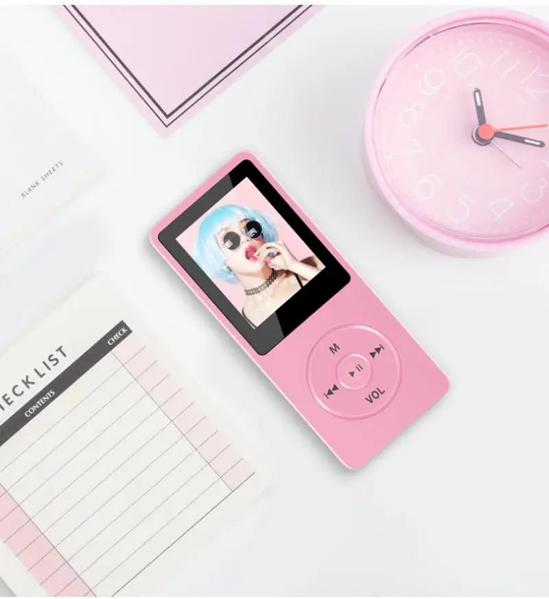 Pink portable mp3 player with charging record digital display screen and circular buttons for lossless portable pocket use