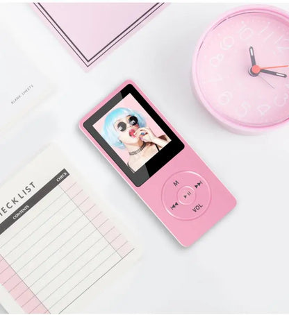 Pink portable mp3 player with charging record digital display screen and circular buttons for lossless portable pocket use