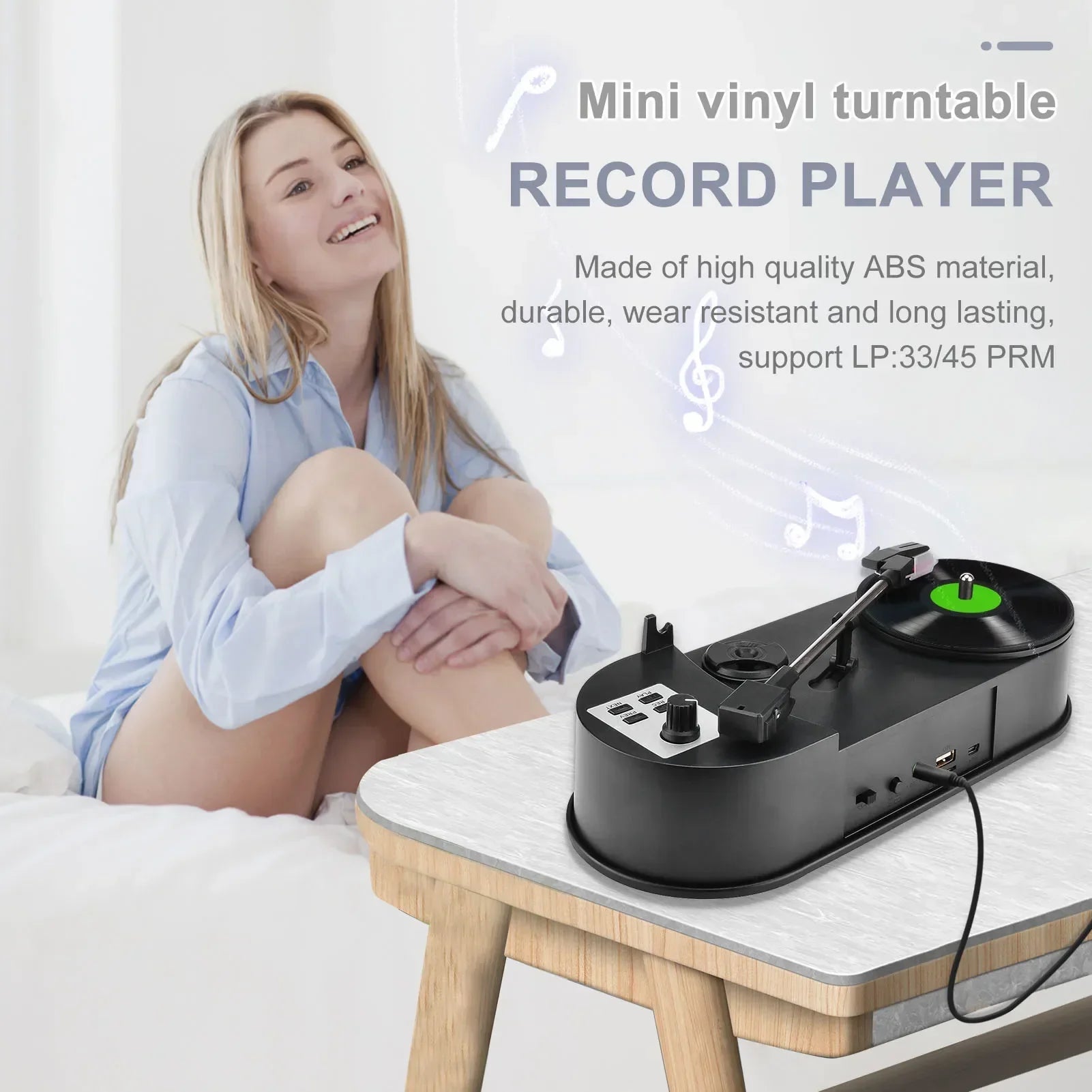 Black portable phonograph 45rpm turntable player with green vinyl record platter and converter save vinyl to mp3 feature