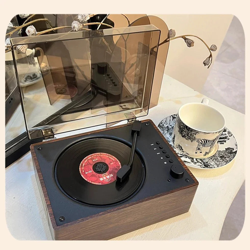 A sleek portable retro cd player with dark wood finish black accents and built-in 2000ma lithium battery