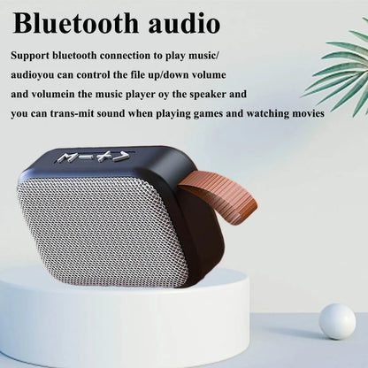 Black and silver portable mini oxford loudspeaker with textured mesh grille carrying strap and column 3d stereo controls