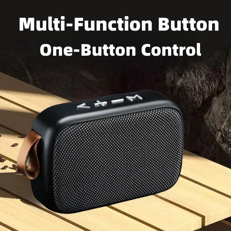Black portable mini oxford loudspeaker with textured grille silver buttons and brown leather strap for player surround hifi sound
