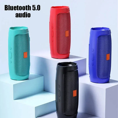 Portable subwoofer bluetooth speakers in red teal blue and black with orange accents for bluetooth speakers outdoor use