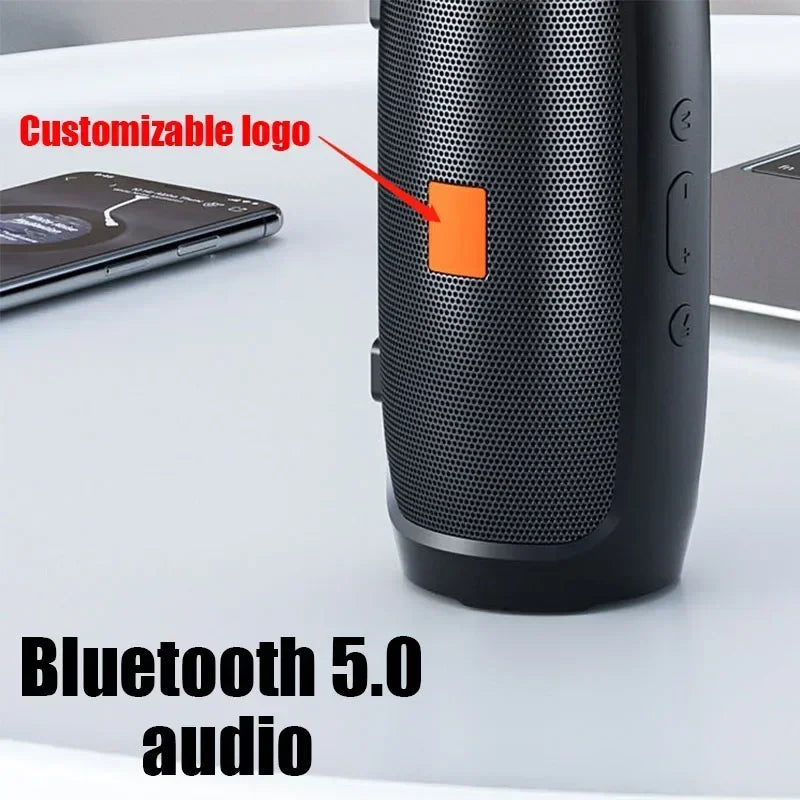 Black portable subwoofer bluetooth speaker with orange logo panel and waterproof loudspeaker wireless for outdoor stereo surround use